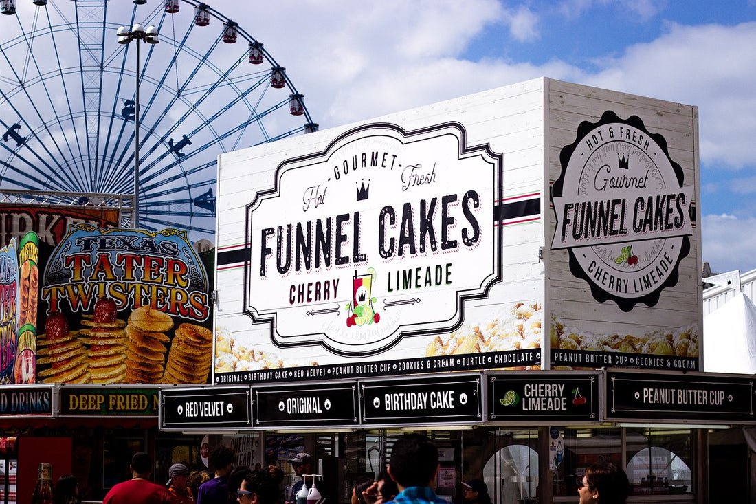 CARNIVAL WITH FOOD BOOTH AND FERRIS WHEEL. Image by Alberto Adán from Pixabay